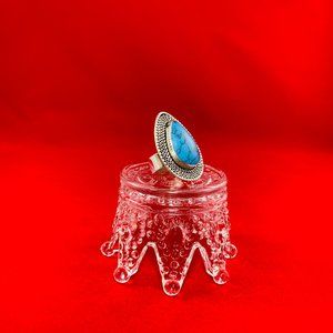 teardrop shaped rings with stone